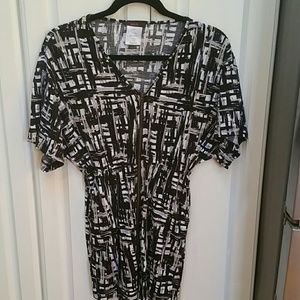 MARK.  Dress with full length zippered front.